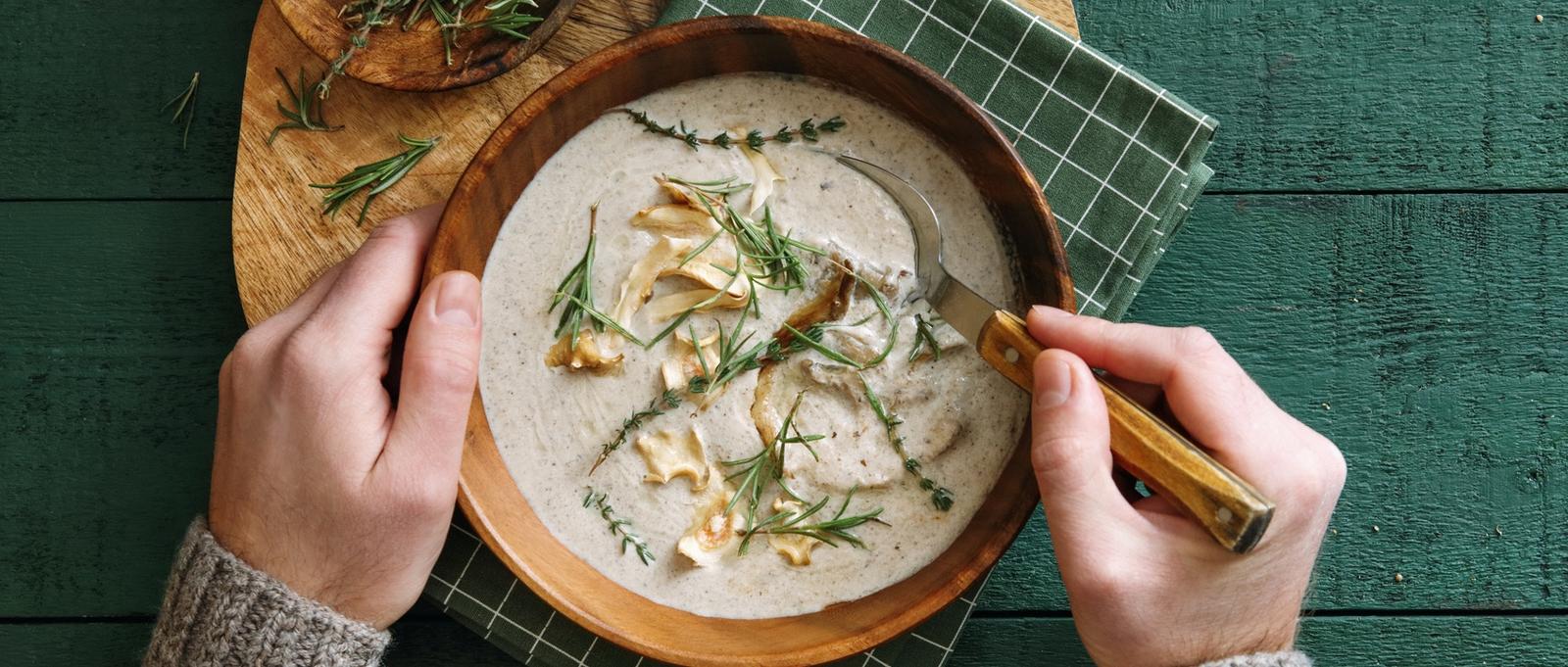 Creamy vegan wild mushroom soup with herbs recommended to eat with tonsilitis