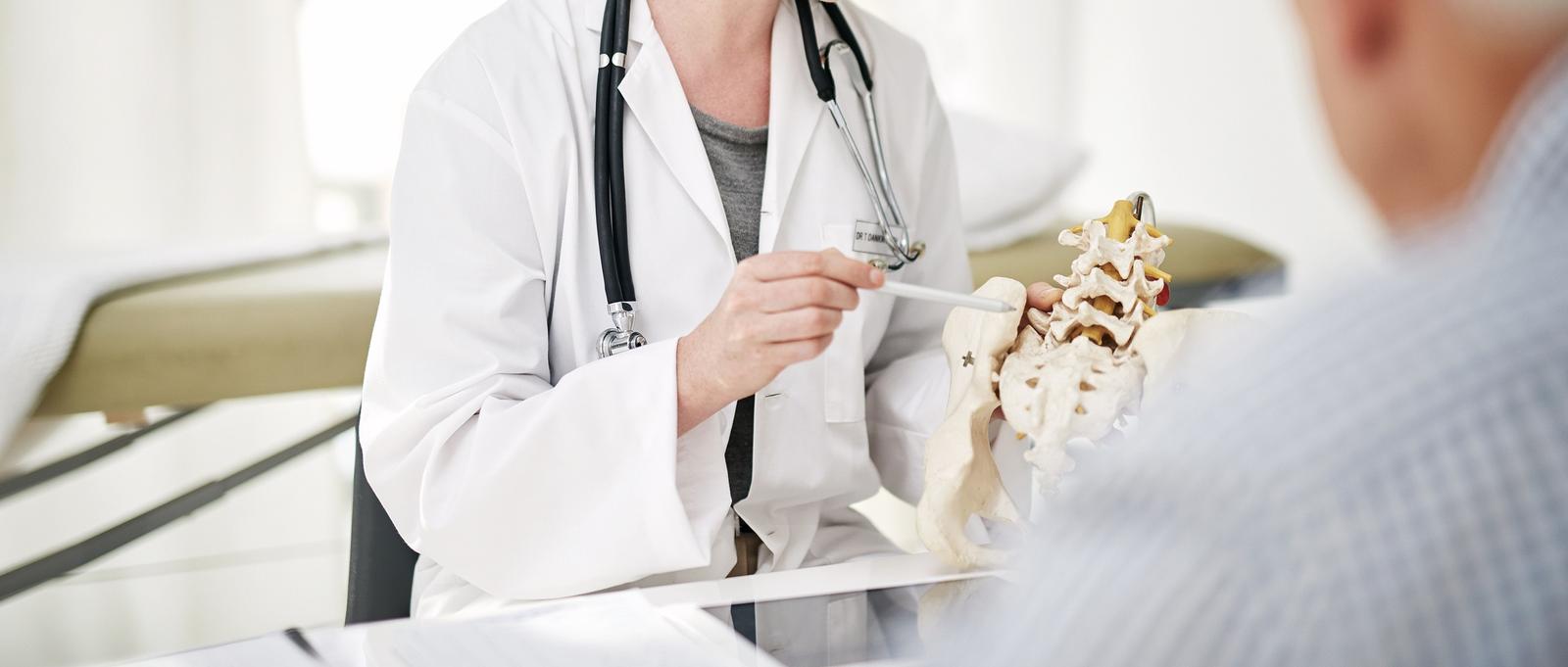 A doctor checking bones