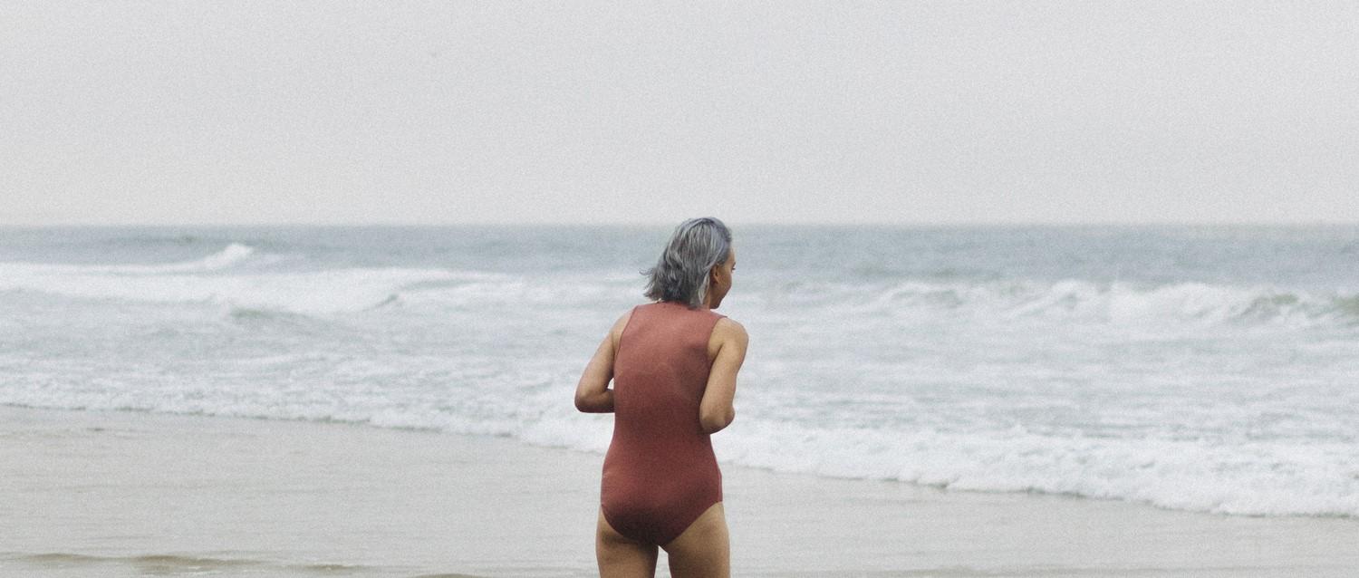 Elderly Woman By Sea